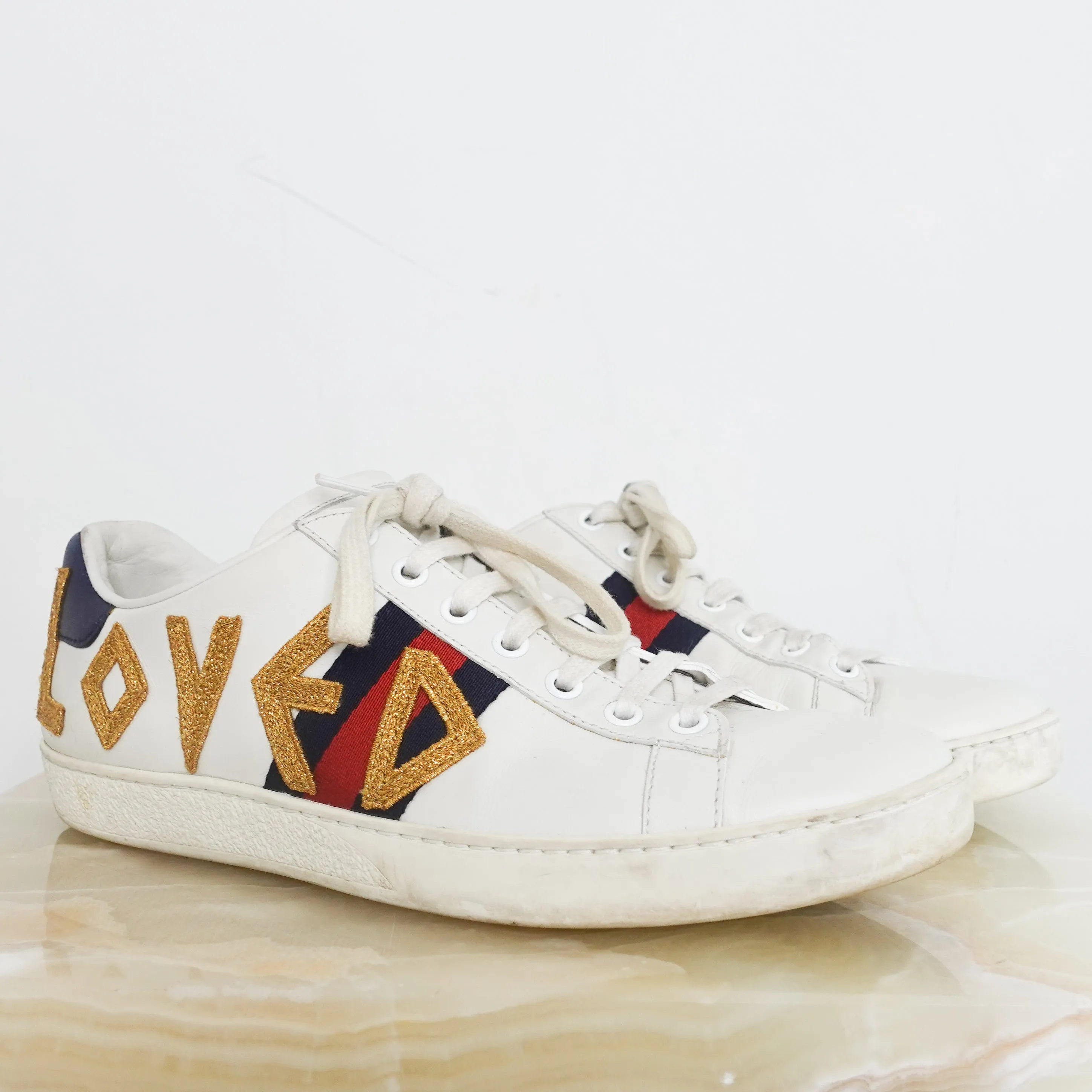 Aced ‘Loved’ leather trainers RRP £625
